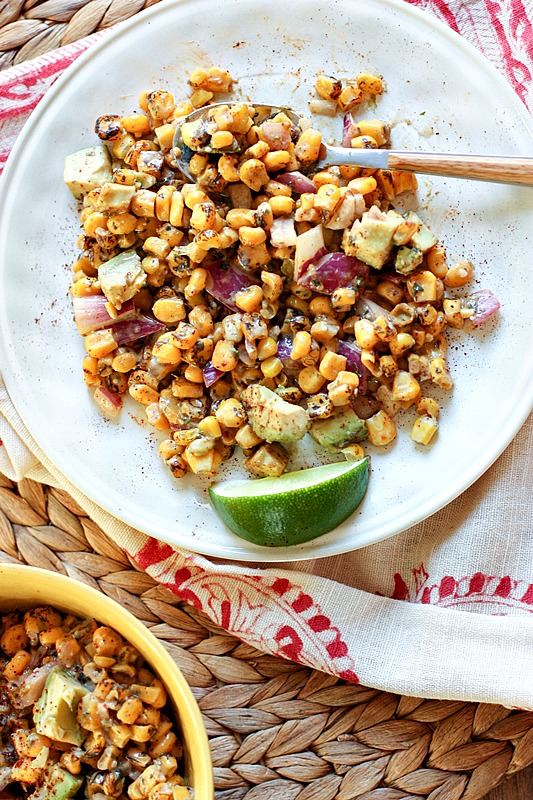 Roasted Corn Salad with Avocado tossed in a lime yogurt dressing! Perfect picnic dish! @danielleomar