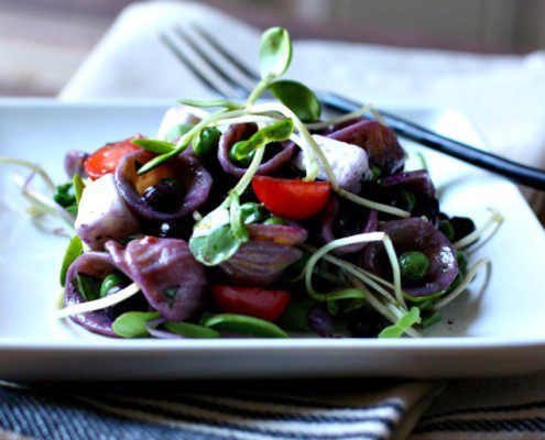 Wild Blueberry Pasta with Peas and Microgreens