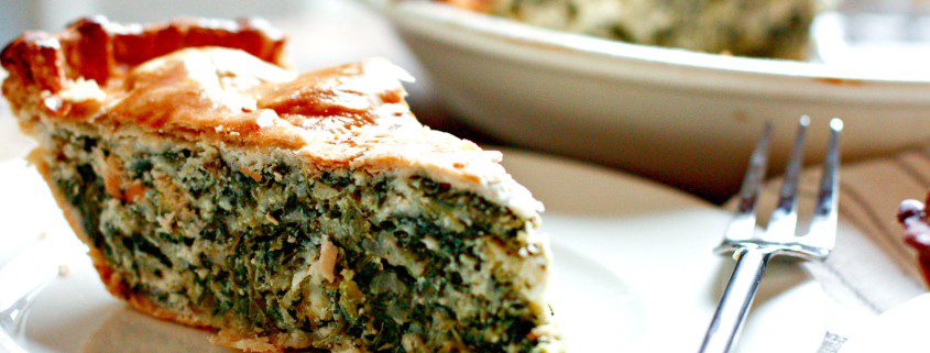 My mom's famous spinach pie is an easy crowd pleaser! It's cheesy and delicious, but still chock full of healthy greens! #dinner #cleaneats @danielleomar