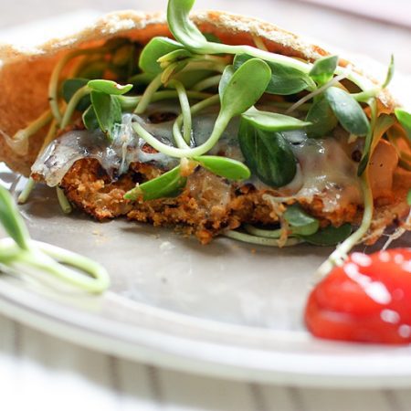 Freezer Friendly bean burgers on whole wheat pita! Perfect for a quick, healthy vegetarian dinner!