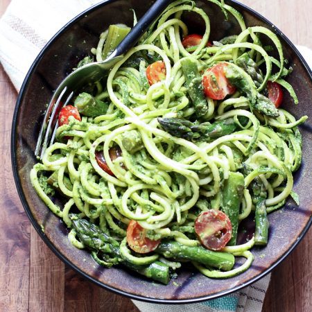 This is a delicious salad! I spiralized zucchini noodles then tossed with a creamy spinach pistachio pesto. Sauteed asparagus and cherry tomatoes are a great way to enjoy summer's bounty of vegetables. Perfect recipe for quick lunch or weeknight dinner! Great for a picnic, too!